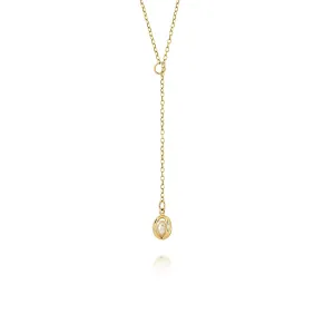 Gold pearl lariat necklace