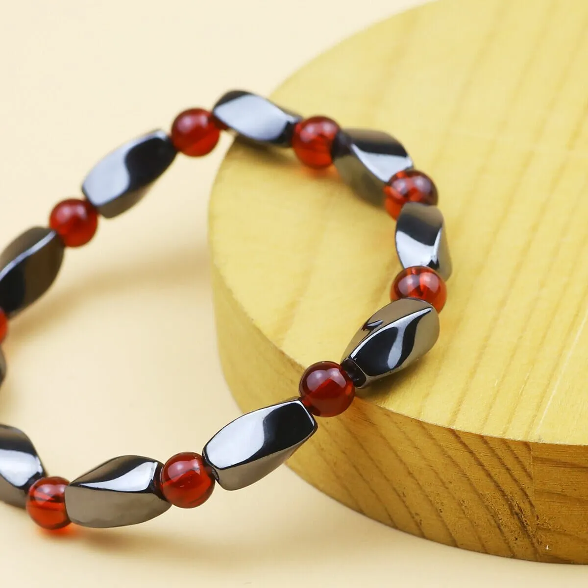 Hematite Stone and Ruby Curved Quadrangular Prism Bracelet