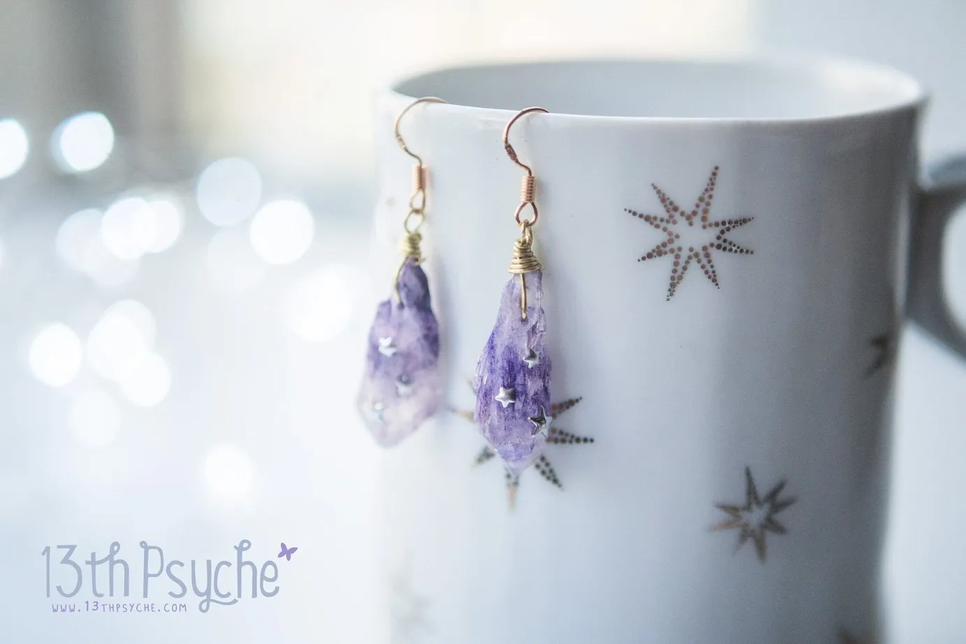 Purple raw stone earrings with silver stars